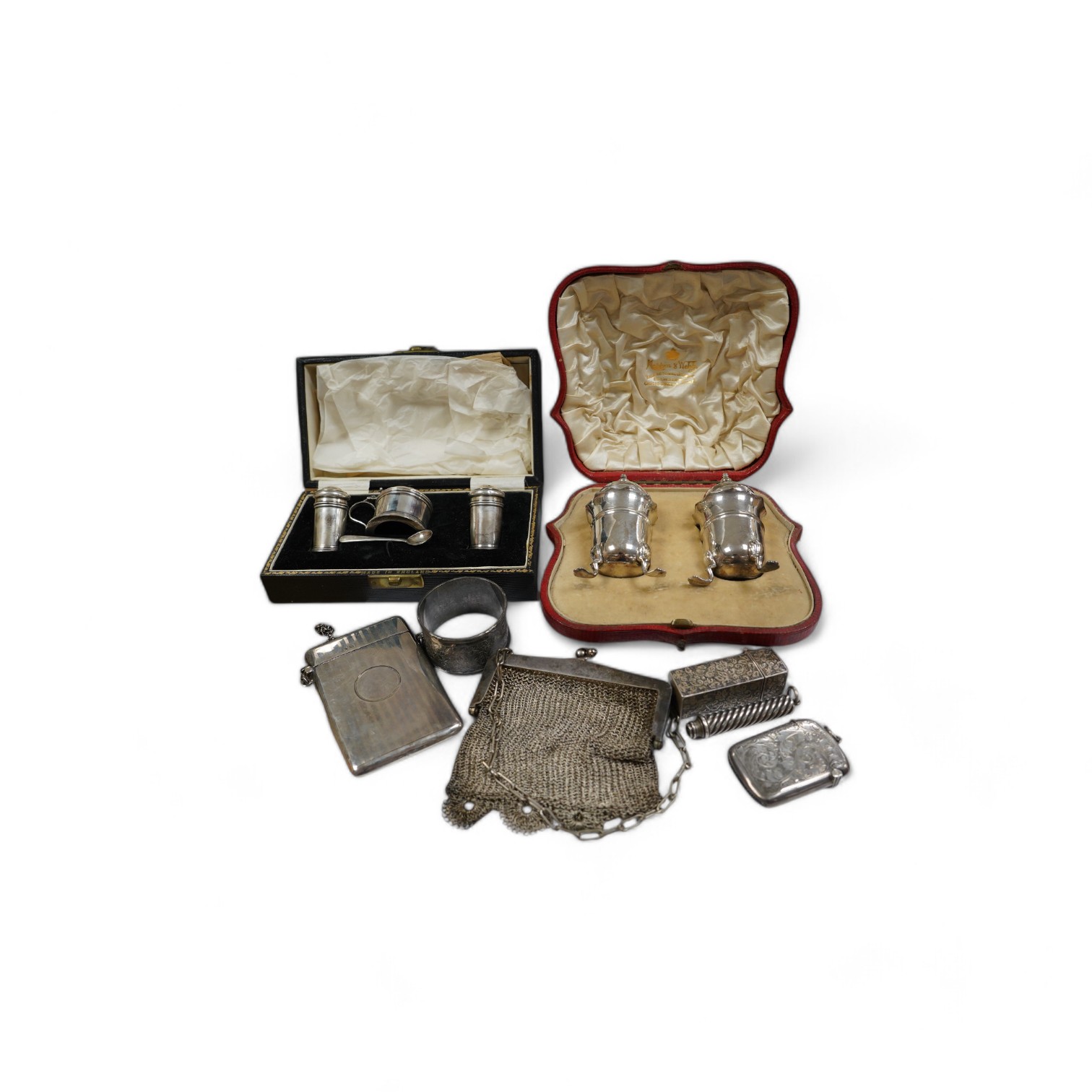 Sundry small silver including two cased condiment sets, a card case, vesta, scent flask, etc. and a plated evening bag. Condition - poor to fair